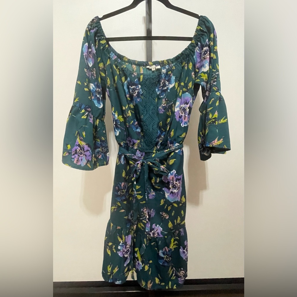 Speed Control New York dress. Can be worn off or on shoulder. Bell sleeves.
